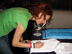 ursula whittaker signing wizard jeans for charity.jpg